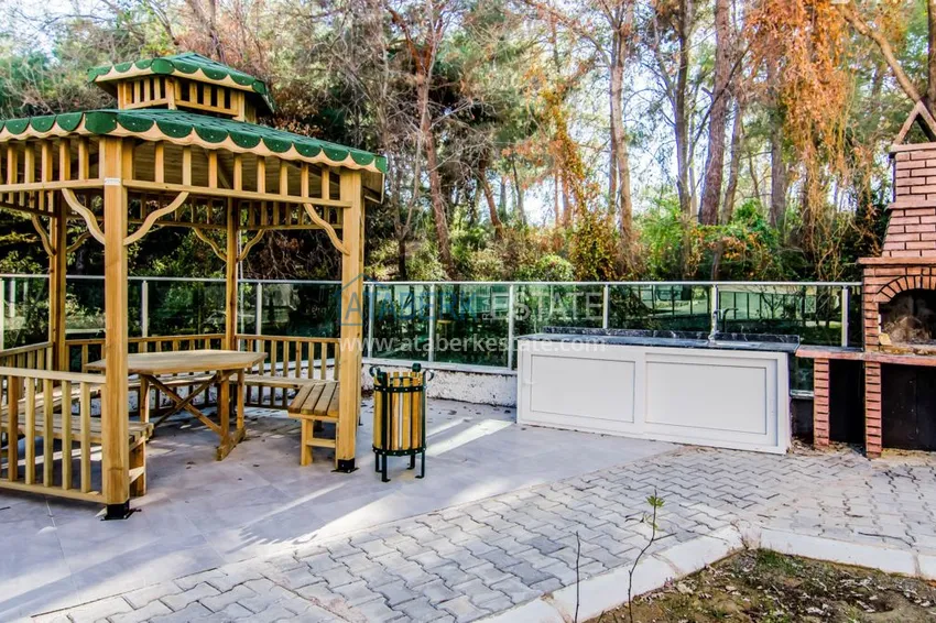 Квартиры в Авсалларе меблированные с видом на лес в современном комплексе  9 