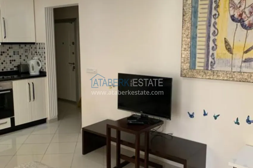 Приобрести Трехкомнатная квартира в Алании с мебелью в районе пляжа Клеопатра 9 