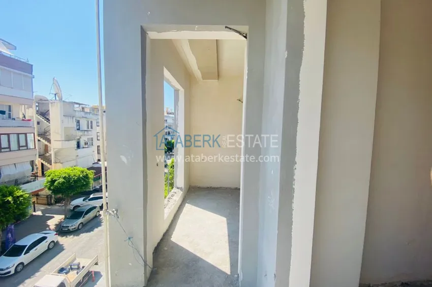 Приобрести Двухкомнатная квартира в центре Алании с частичным видом на море в строящемся комплексе  8 