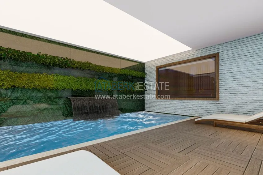 Двухкомнатная квартира в центре Алании с частичным видом на море в строящемся комплексе  8 