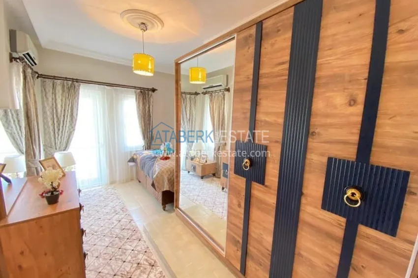 Приобрести Таунхаус в районе Демирташ с мебелью и открытым видом на море  10 