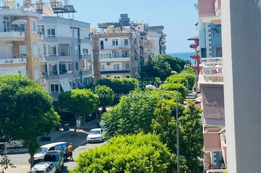 Приобрести Двухкомнатная квартира в центре Алании с частичным видом на море в строящемся комплексе  11 