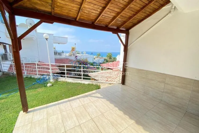 Таунхаус в районе Демирташ с мебелью и открытым видом на море  12 