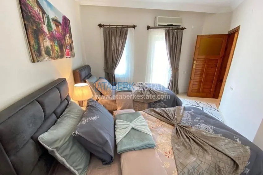 Приобрести Таунхаус в районе Демирташ с мебелью и открытым видом на море  11 