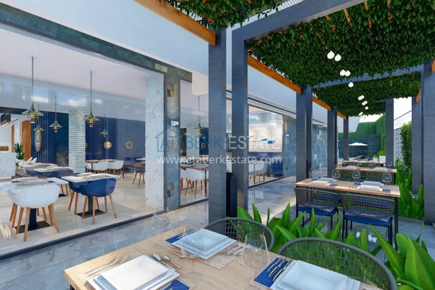 Двухкомнатная квартира в центре Алании с частичным видом на море в строящемся комплексе  11 