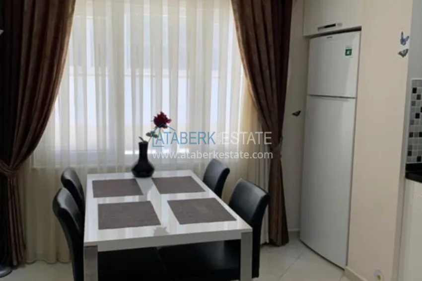 Приобрести Трехкомнатная квартира в Алании с мебелью в районе пляжа Клеопатра 11 