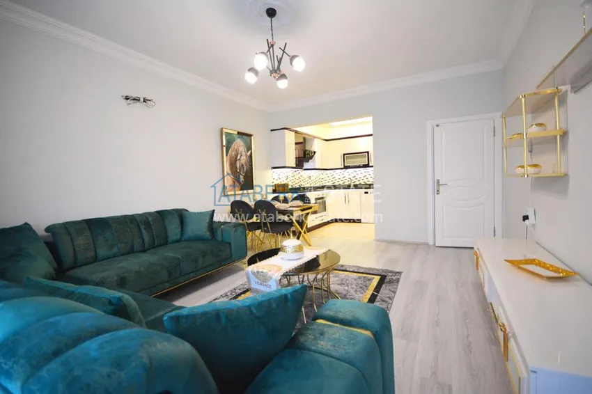 Приобрести Квартира в Махмутларе с современной новой мебелью на центральной улице 9 