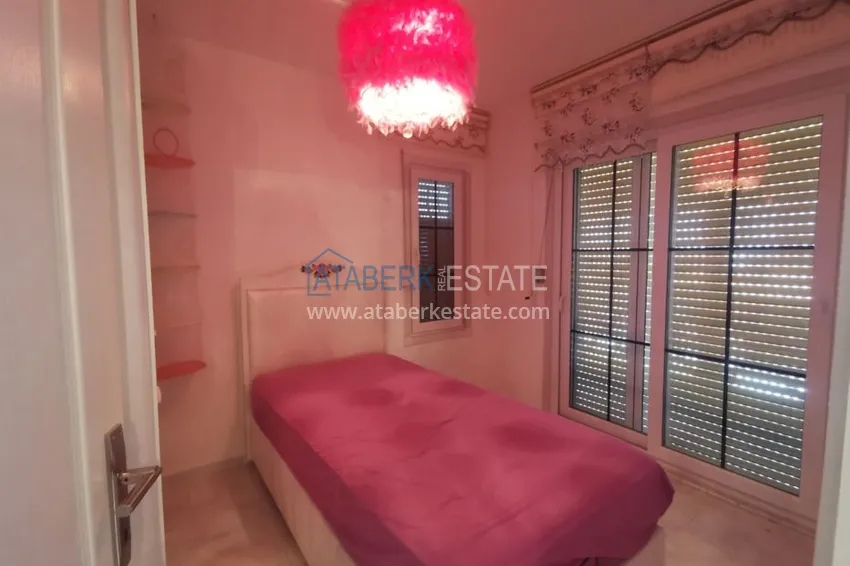 Приобрести Вилла в районе Демирташ с мебелью, садиком и великолепным видом на море  13 