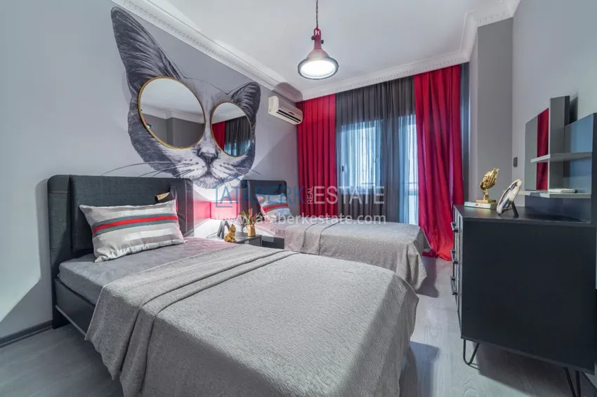 Приобрести Квартира в Махмутларе трехкомнатная со стильным интерьером  9 