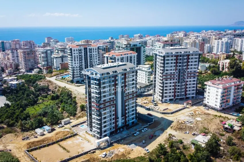 Квартира в Махмутларе с отдельной кухней в многоэтажной новостройке 1 