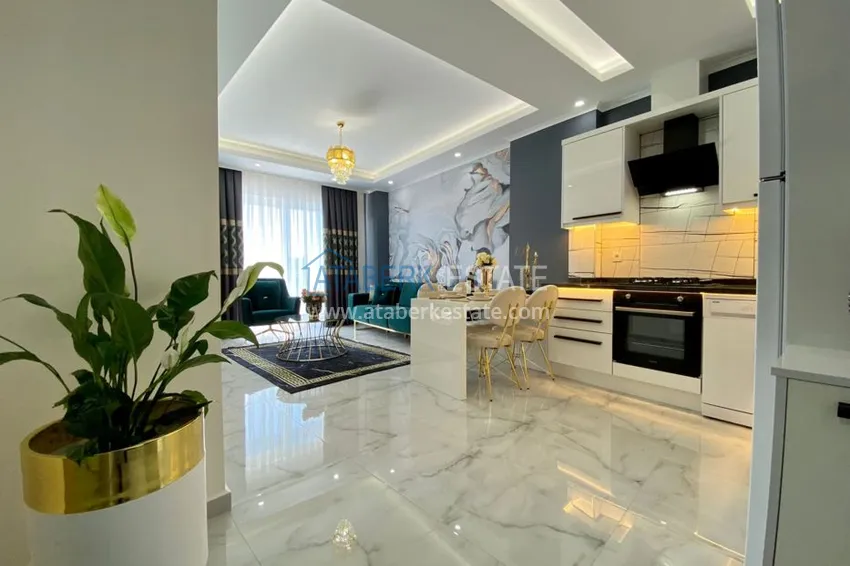 Приобрести Квартиры в Махмутларе, с новой мебелью в современном комплексе 1 