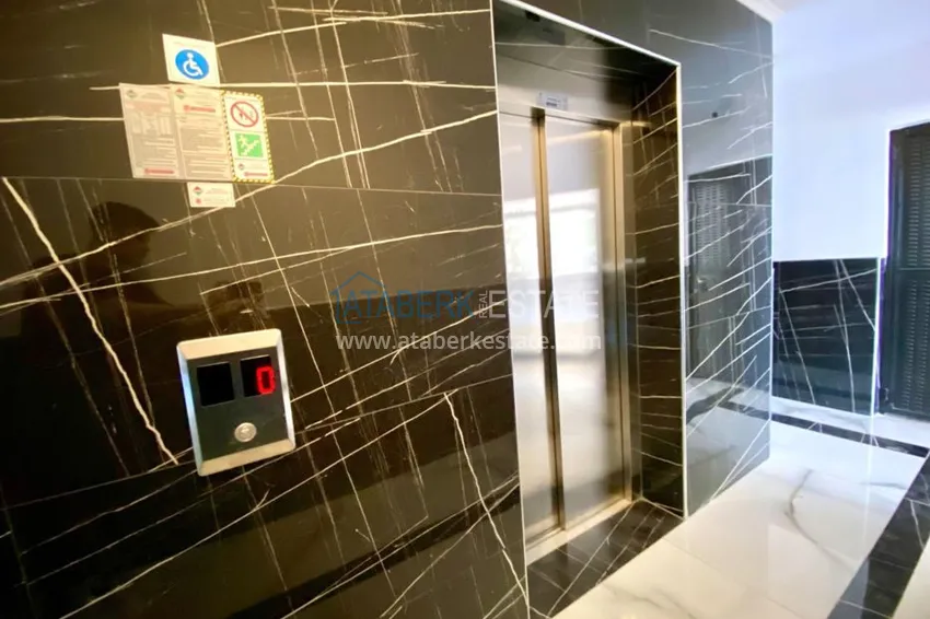 Квартира в Махмутларе с чистовой отделкой, в комфортабельном комплексе 10 