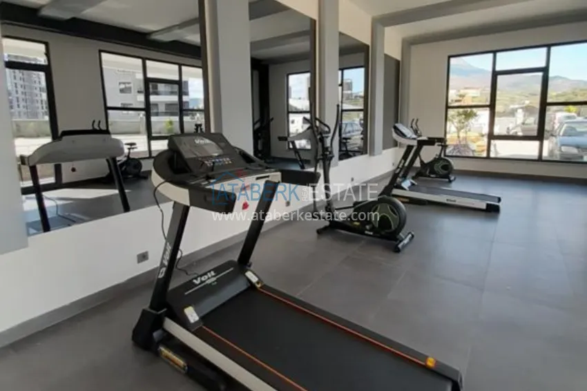 Квартира в Махмутларе с отдельной кухней в многоэтажной новостройке 12 