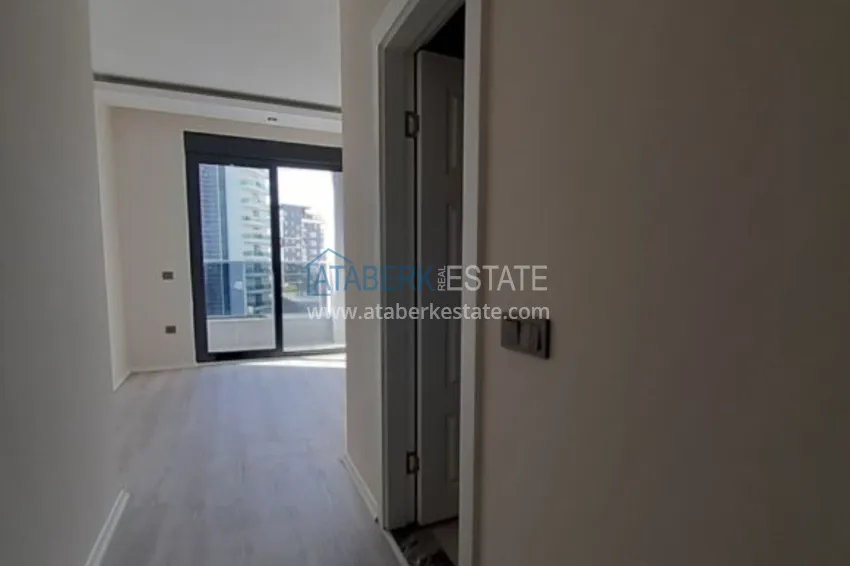 Приобрести Квартира в Махмутларе с отдельной кухней в многоэтажной новостройке 12 