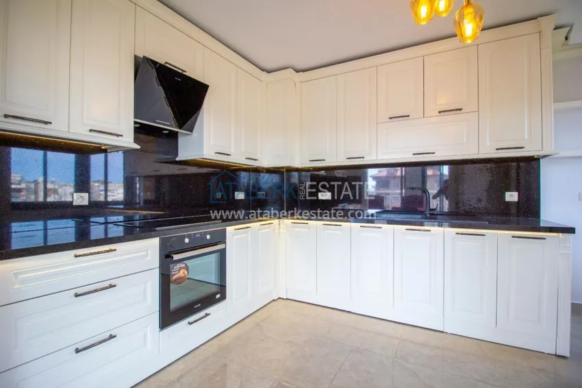 Приобрести Квартира в центре Алании стильный интерьер, отдельная кухня, застекленный балкон  10 