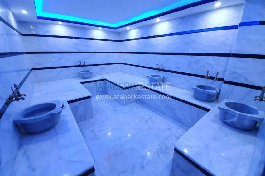 Квартира в Махмутларе с застекленным балконом и мебелью 13 