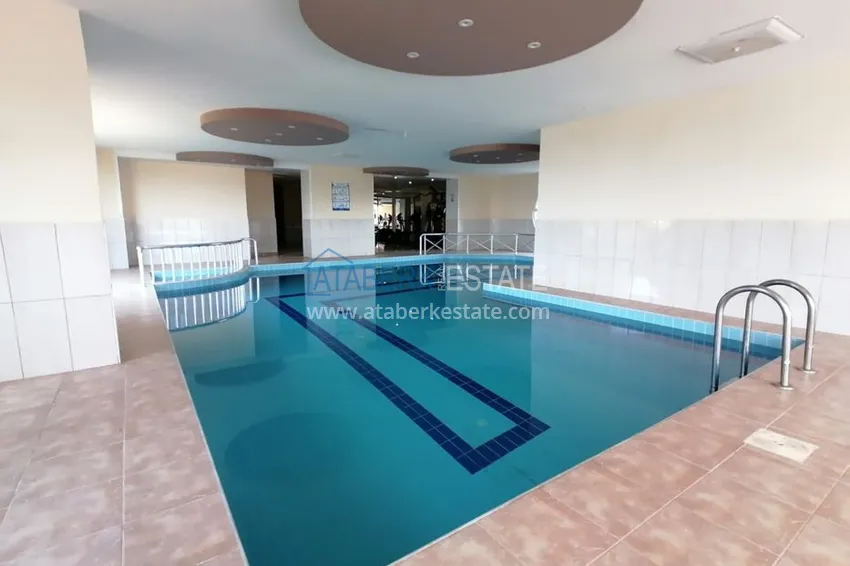 Квартира в Махмутлар меблированная с открытым видом на горы и море  9 