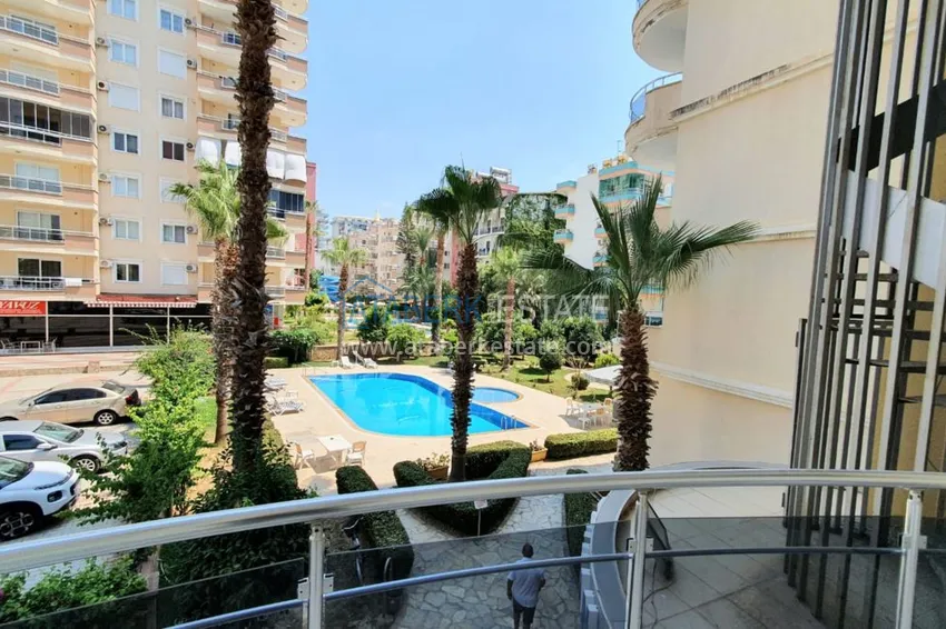 Приобрести Квартира в Махмутларе с мебелью, видом на море на центральной улице 12 