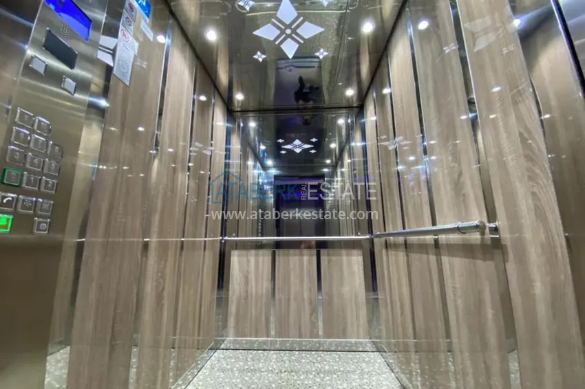 Квартира в Махмутларе с застекленным балконом и мебелью 15 