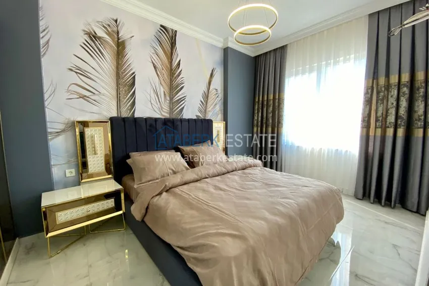 Приобрести Квартиры в Махмутларе, с новой мебелью в современном комплексе 12 