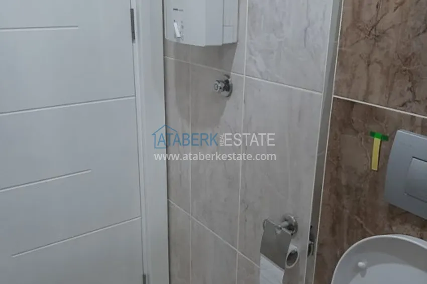 Приобрести Квартира в Махмутларе с застекленным балконом и мебелью 13 