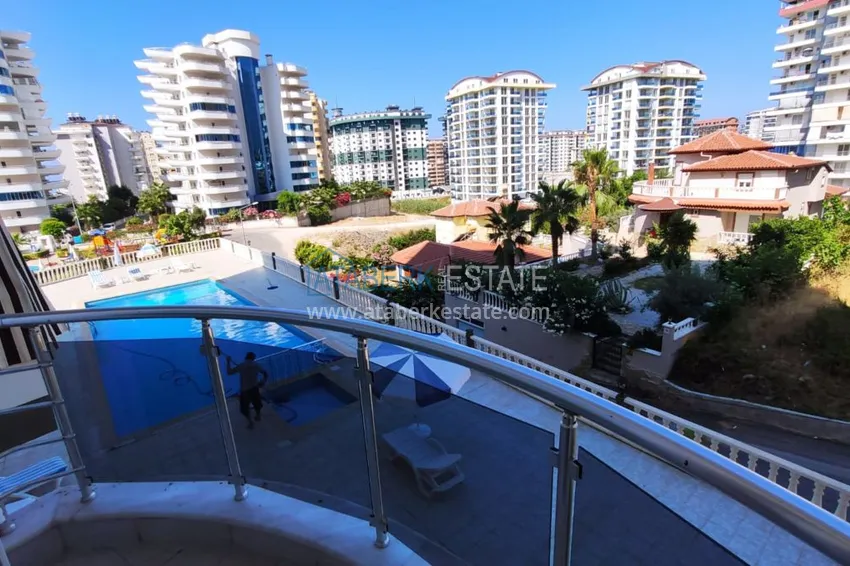 Приобрести Квартира в Махмутларе трехкомнатная с видом на горы в жилом комплексе  15 