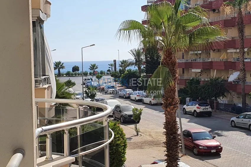 Приобрести Квартира в Махмутларе с мебелью, видом на море на центральной улице 18 