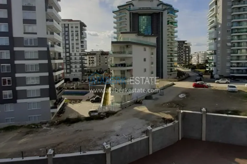 Приобрести Квартира в Махмутларе с отдельной кухней в многоэтажной новостройке 19 