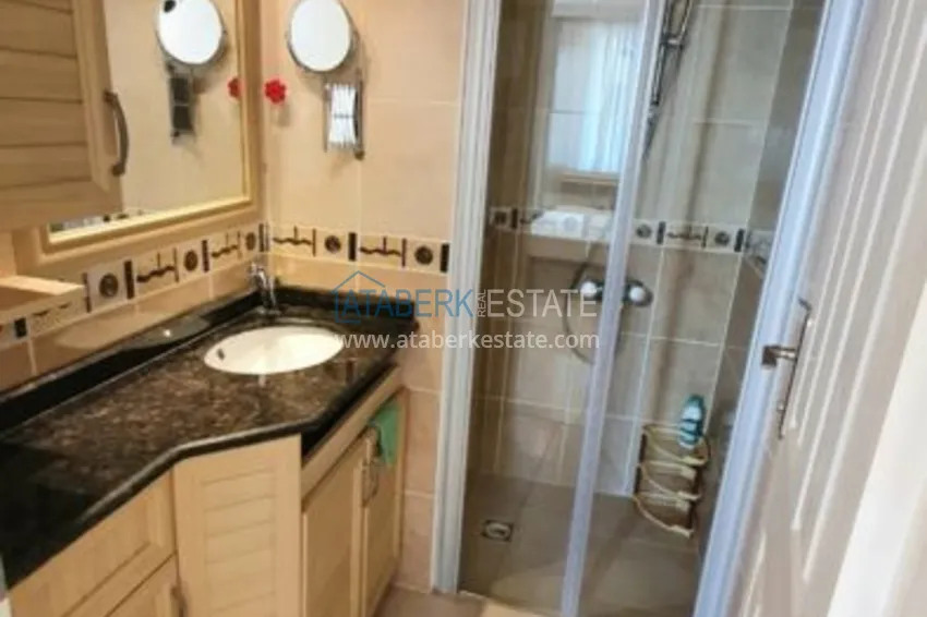 Приобрести Квартира в Махмутларе с мебелью, видом на море на центральной улице 15 