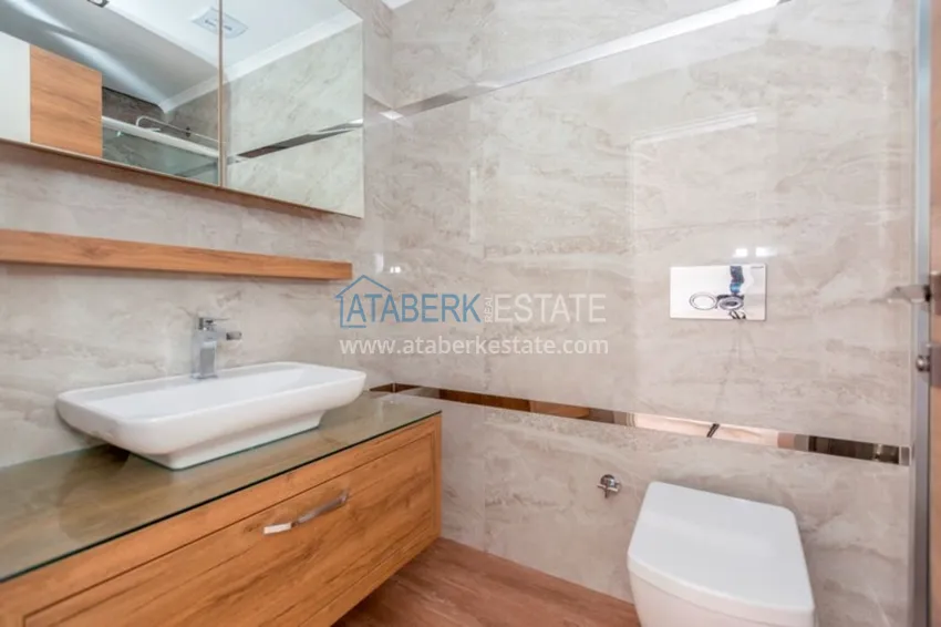 Приобрести Квартиры в центре Алании - новостройка, район пляжа Кейкубат, 50 метров от моря  23 