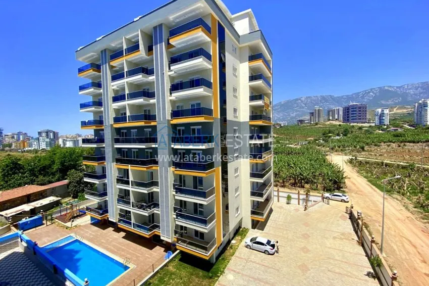 Квартира в Махмутларе с чистовой отделкой, в комфортабельном комплексе 1 