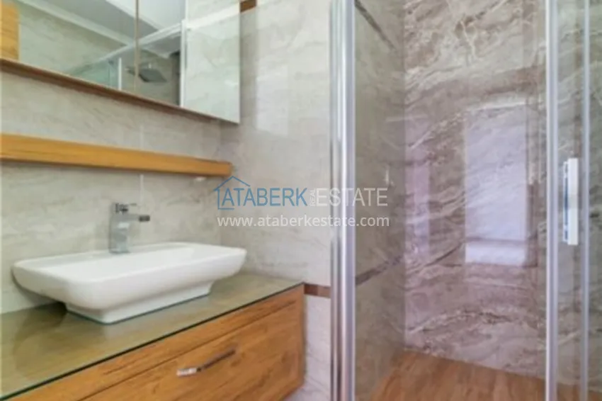 Приобрести Квартиры в центре Алании - новостройка, район пляжа Кейкубат, 50 метров от моря  24 