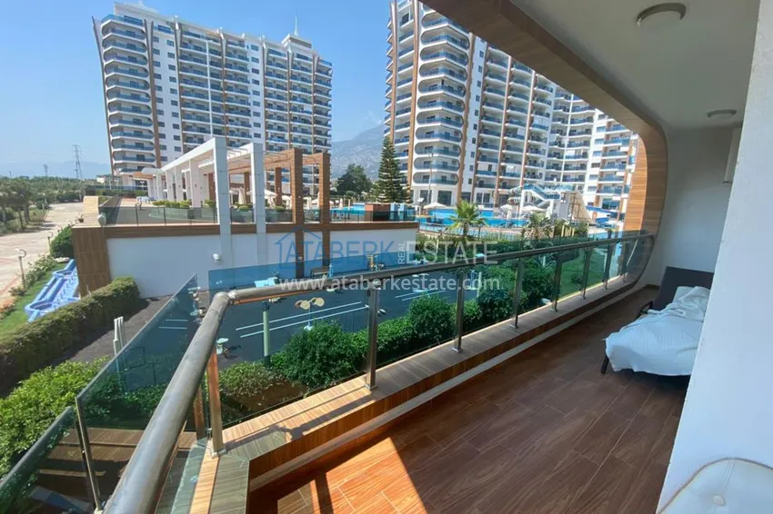 Приобрести Квартира в Махмутларе меблированные в роскошном комплексе с собственным пляжем 20 