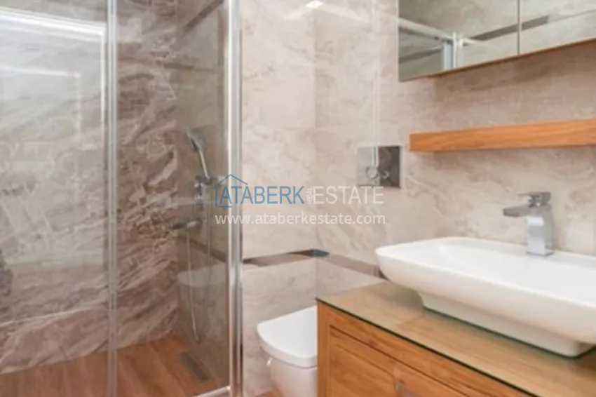 Приобрести Квартиры в центре Алании - новостройка, район пляжа Кейкубат, 50 метров от моря  25 