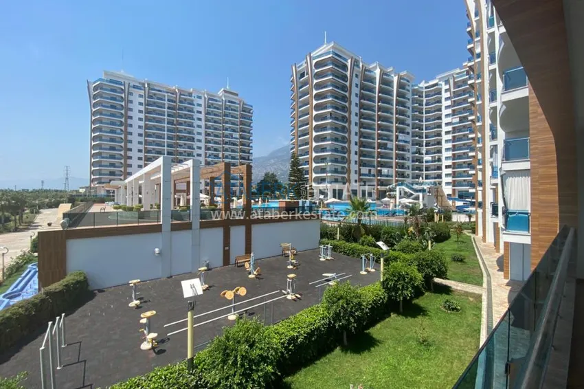 Приобрести Квартира в Махмутларе меблированные в роскошном комплексе с собственным пляжем 21 