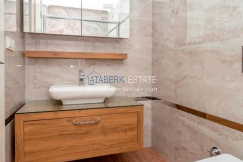 Приобрести Квартиры в центре Алании - новостройка, район пляжа Кейкубат, 50 метров от моря  27 