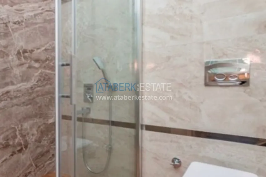 Приобрести Квартиры в центре Алании - новостройка, район пляжа Кейкубат, 50 метров от моря  28 