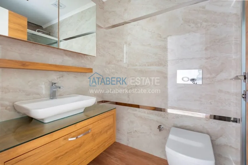 Приобрести Квартиры в центре Алании - новостройка, район пляжа Кейкубат, 50 метров от моря  31 