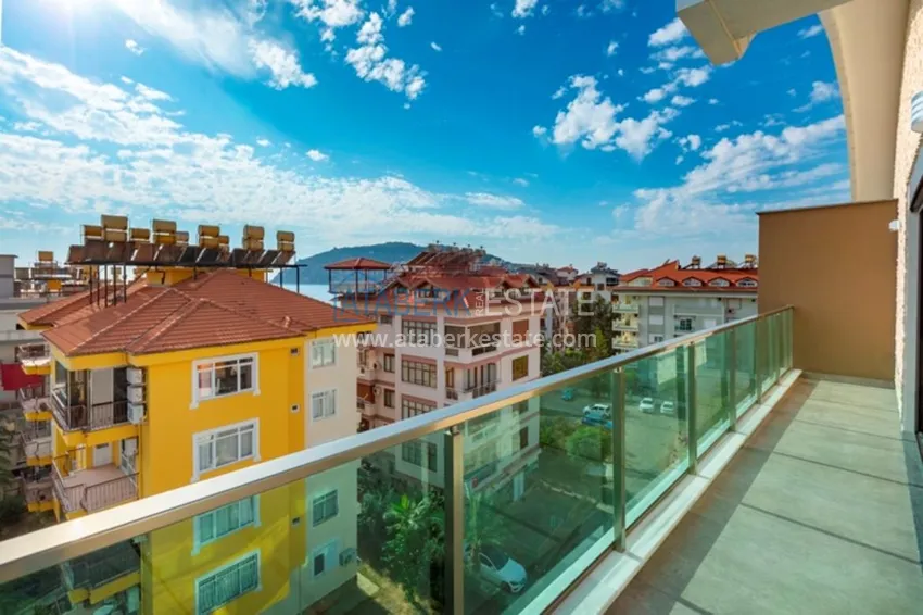 Приобрести Квартиры в центре Алании - новостройка, район пляжа Кейкубат, 50 метров от моря  32 