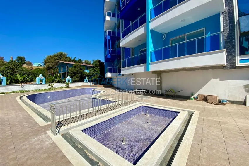 Квартиры в Махмутларе, с новой мебелью в современном комплексе 4 