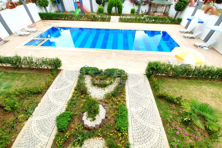 Квартира в Махмутларе с застекленным балконом и мебелью 6 