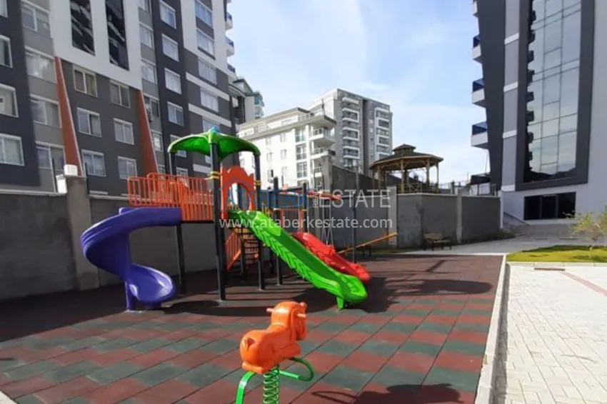 Квартира в Махмутларе с отдельной кухней в многоэтажной новостройке 4 