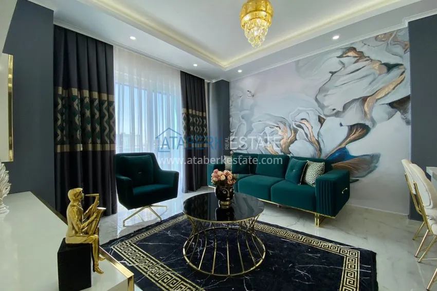 Приобрести Квартиры в Махмутларе, с новой мебелью в современном комплексе 5 