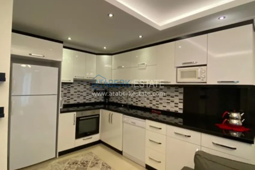 Приобрести Квартира в Махмутларе с мебелью около моря 5 