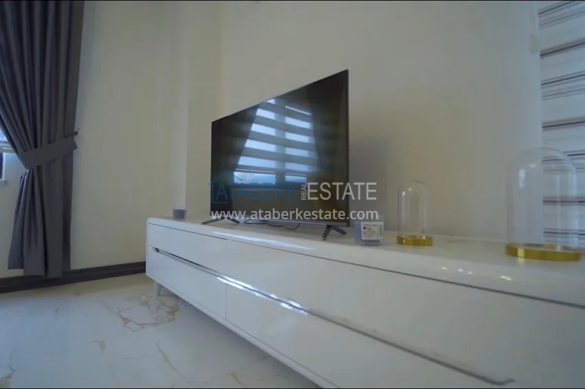 Приобрести Квартира в Махмутларе с мебелью, в молодом жилом комплексе 4 