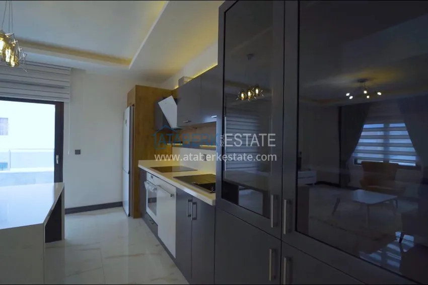 Приобрести Квартира в Махмутларе с мебелью, в молодом жилом комплексе 5 