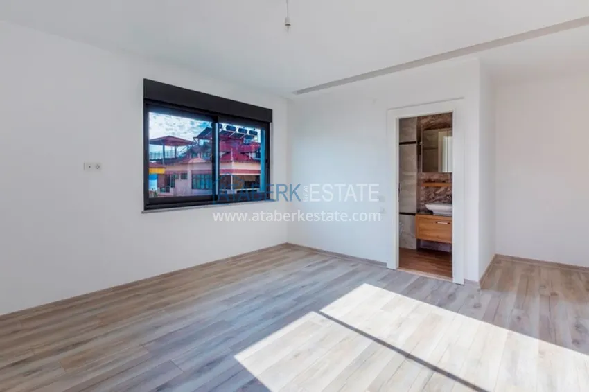 Приобрести Квартиры в центре Алании - новостройка, район пляжа Кейкубат, 50 метров от моря  9 