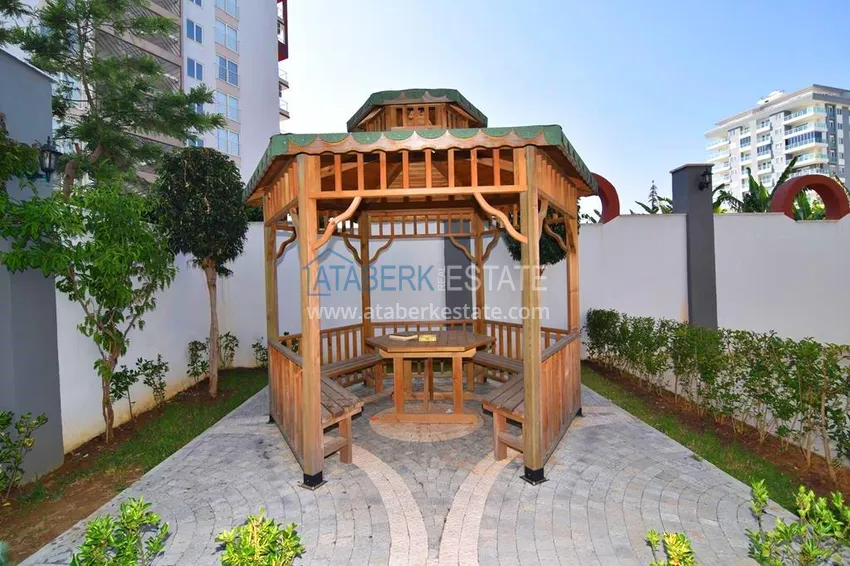 Квартира в Махмутларе с застекленным балконом и мебелью 10 