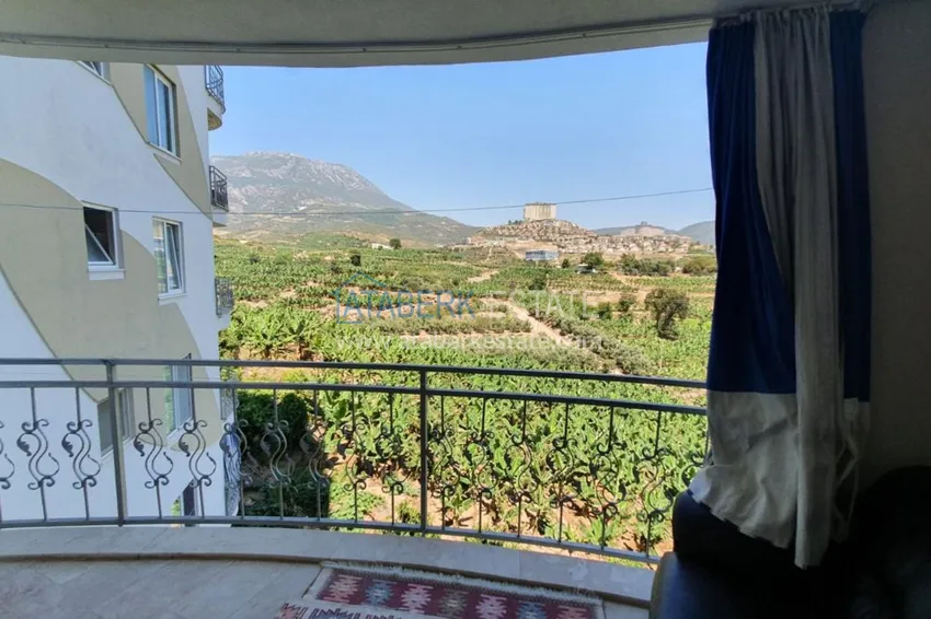 Приобрести Квартира в Махмутлар меблированная с открытым видом на горы и море  10 