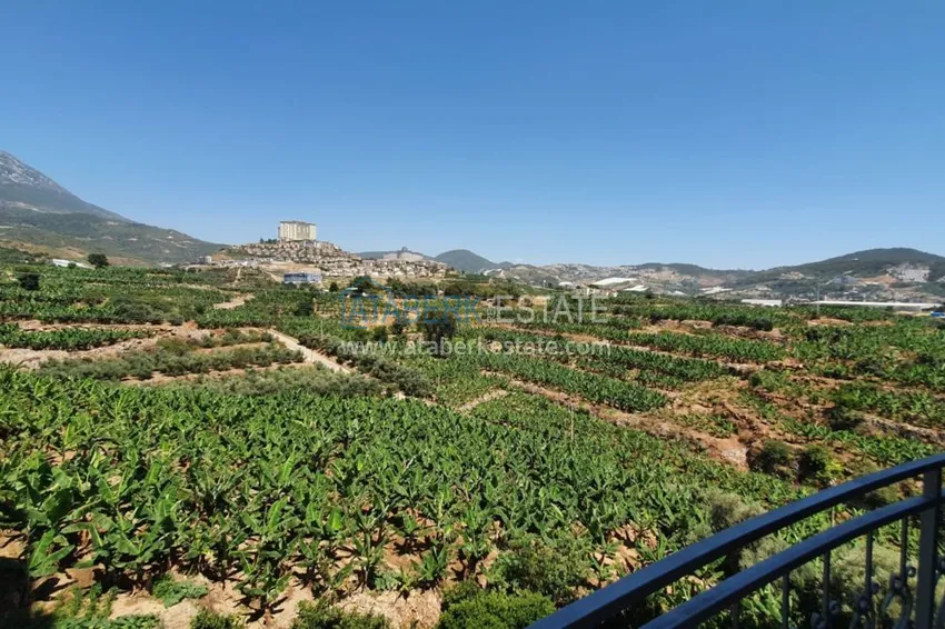 Приобрести Квартира в Махмутлар меблированная с открытым видом на горы и море  12 